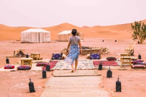 Indulge in the Magic of Morocco: 4-Day Desert Expedition from Marrakech to Merzouga from the bustling streets of Marrakech to the serene beauty of the Sahara Desert in Merzouga. Let the rhythm of the desert guide you as you explore ancient kasbahs, traverse the mesmerizing Atlas Mountains, and experience the warmth of Berber hospitality. This immersive expedition promises an unforgettable blend of cultural discovery, natural wonders, and the allure of the Sahara. let's start the tours of Morocco desert tour in 4 days Indulge in the Magic of Morocco