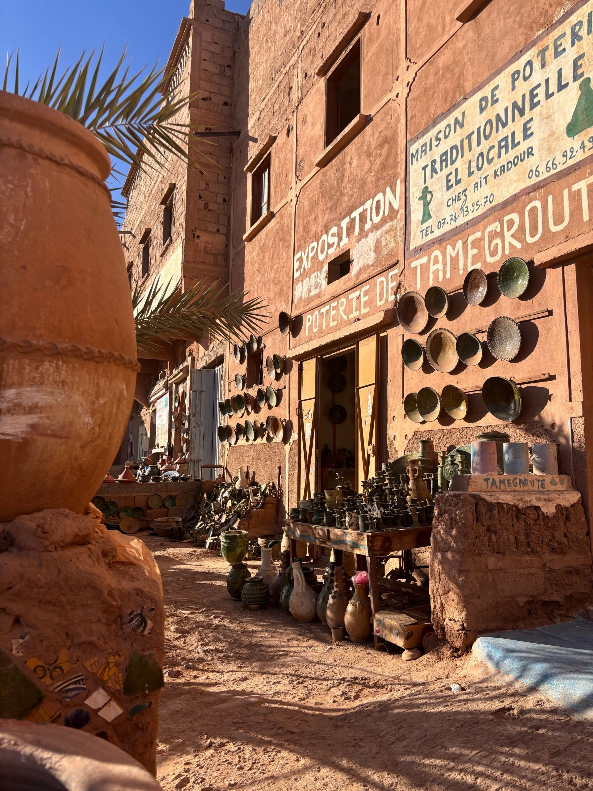 Explore the vibrant pottery market in Tamegroute, Morocco, showcasing traditional clay art.