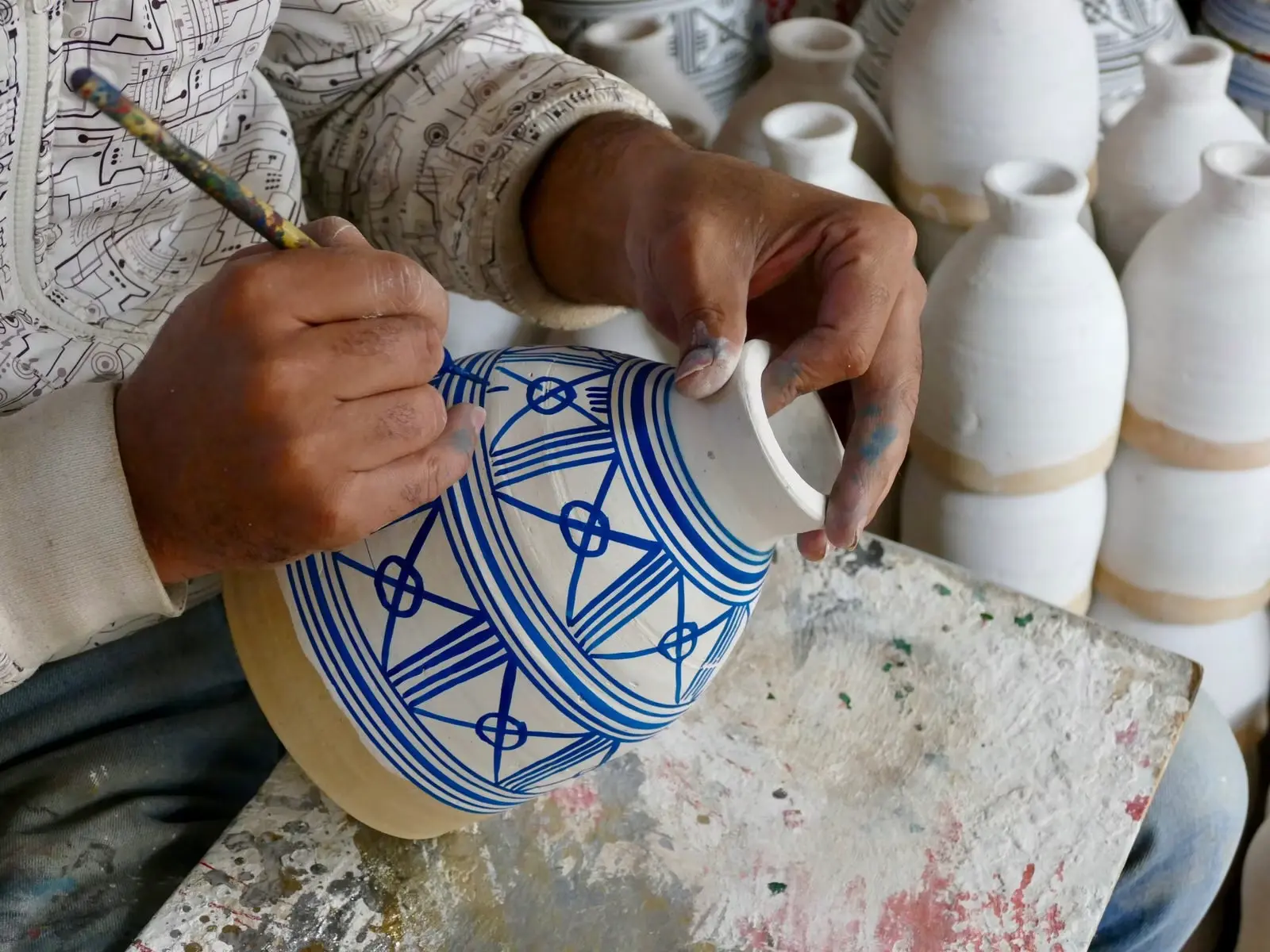 Moroccan Zouaq art workshop Marrakech traditional painted wood and local artisans